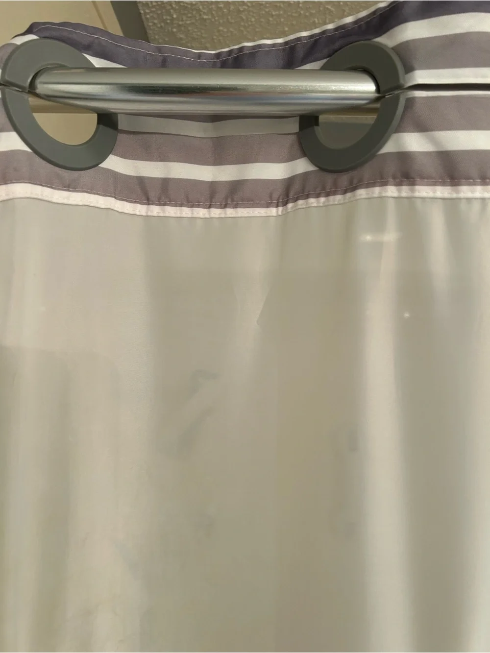 Striped Hookless Shower Curtain in Gray, white and yellow stripes.